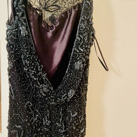 A gorgeous mid length beaded dress by Scala. - Picture 4 of 11